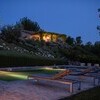 La Segreta Pool and Farmhouse at Night