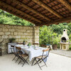 Überdachte Terrasse mit Grill im Ferienhaus Cascina Monferrato
