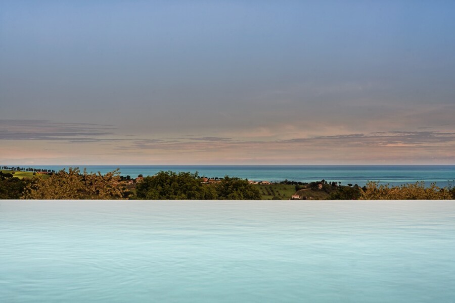 View whilst in infinity pool Villa Olivo Photo credit Davide Bischeri.