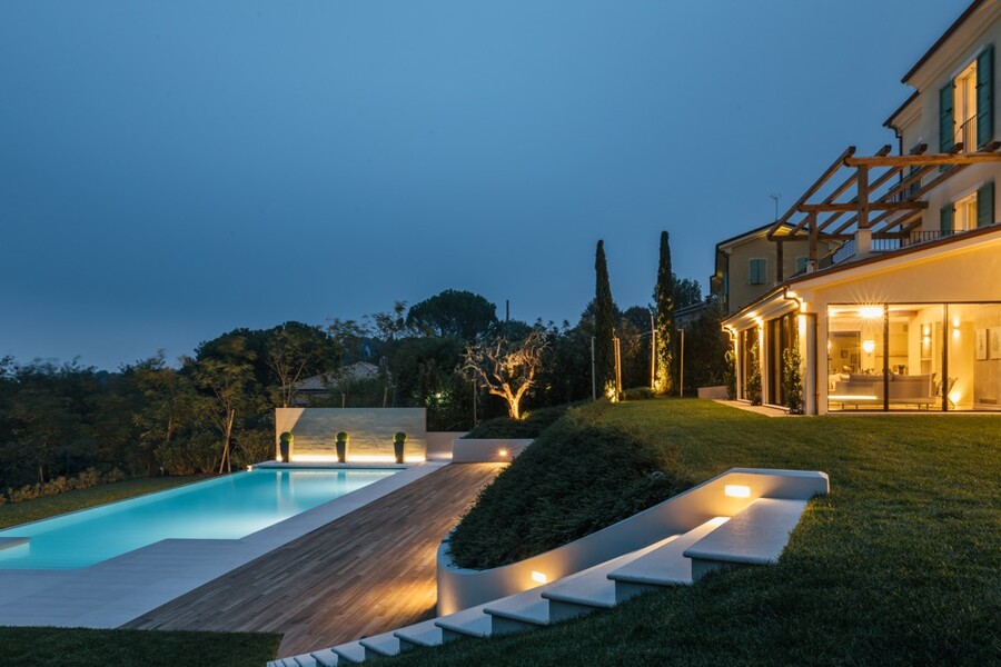 Side view of villa & pool at night Villa Olivo Photo credit Andrea Volpini