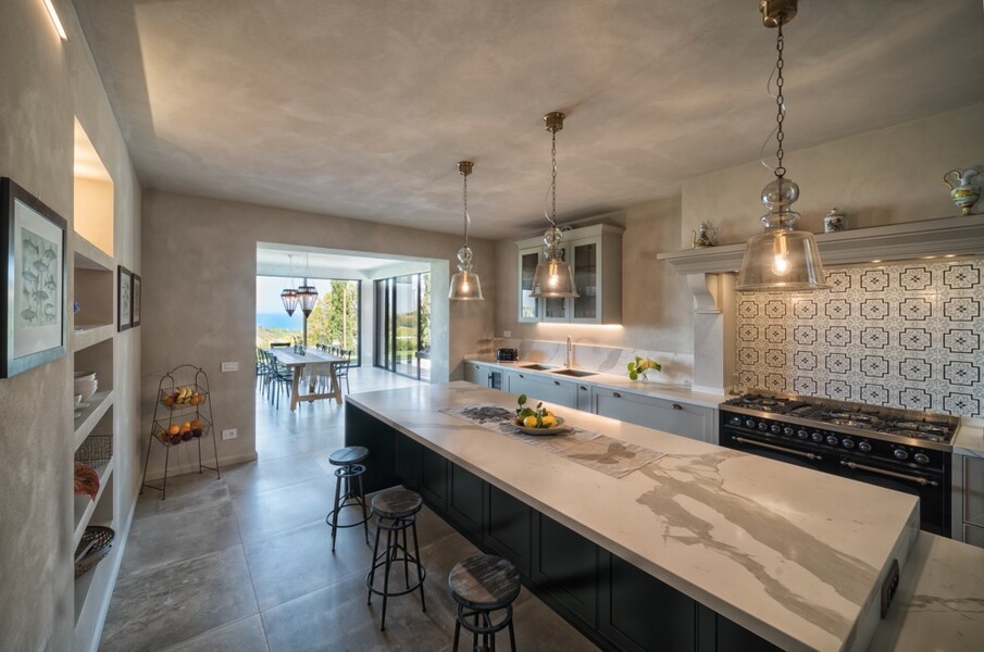 Open plan living Kitchen to dining Villa Olivo Photo credit Davide Bischeri.