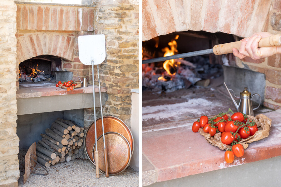 Pizzaofen mit Tomaten und Feuer in der Casa Moscata im Piemont