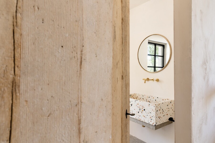 La Casetta at La Segreta Bathroom 1 Close Up with door and terrazzo sink